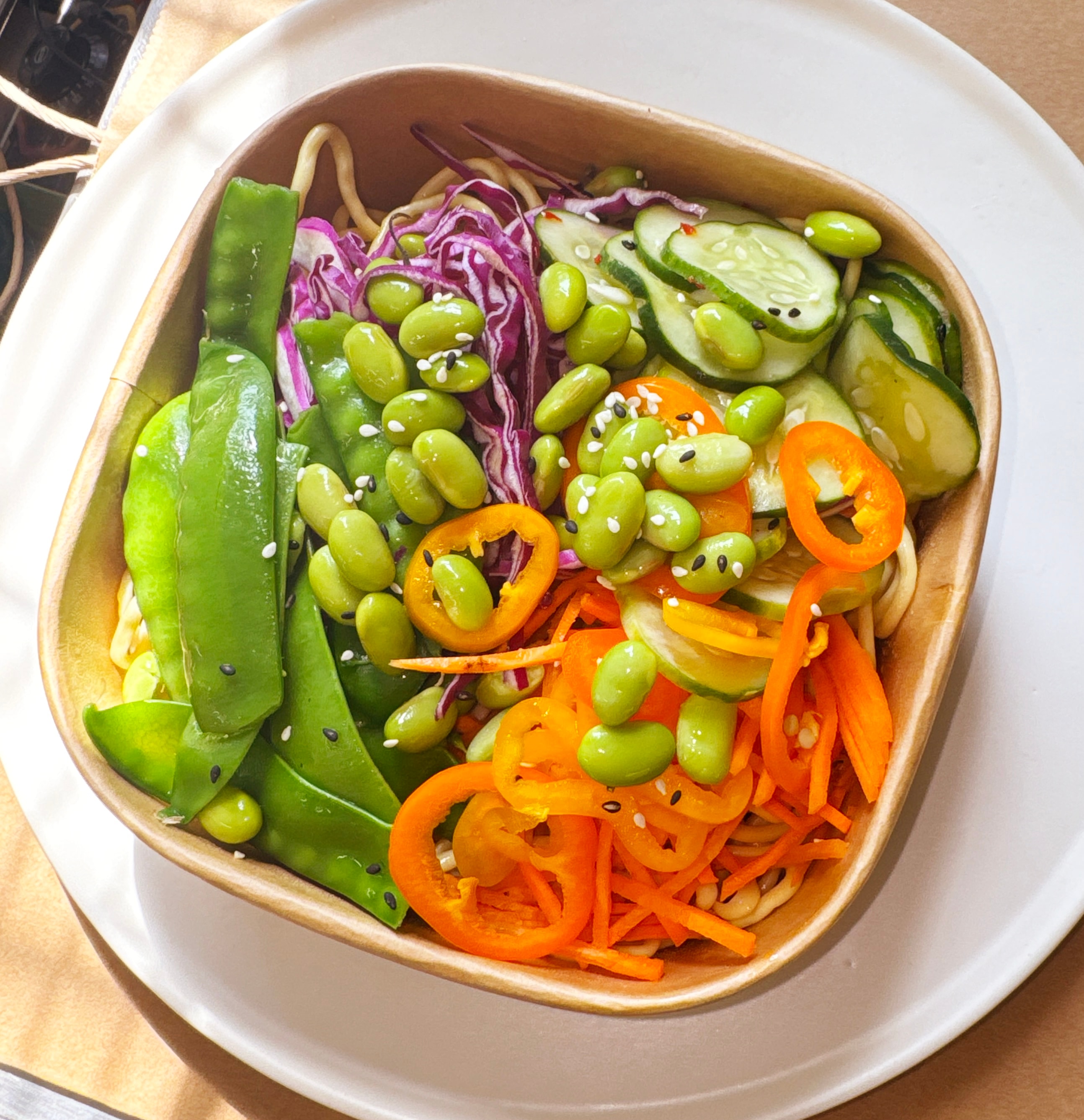 Colorful noodle bowl with edamame