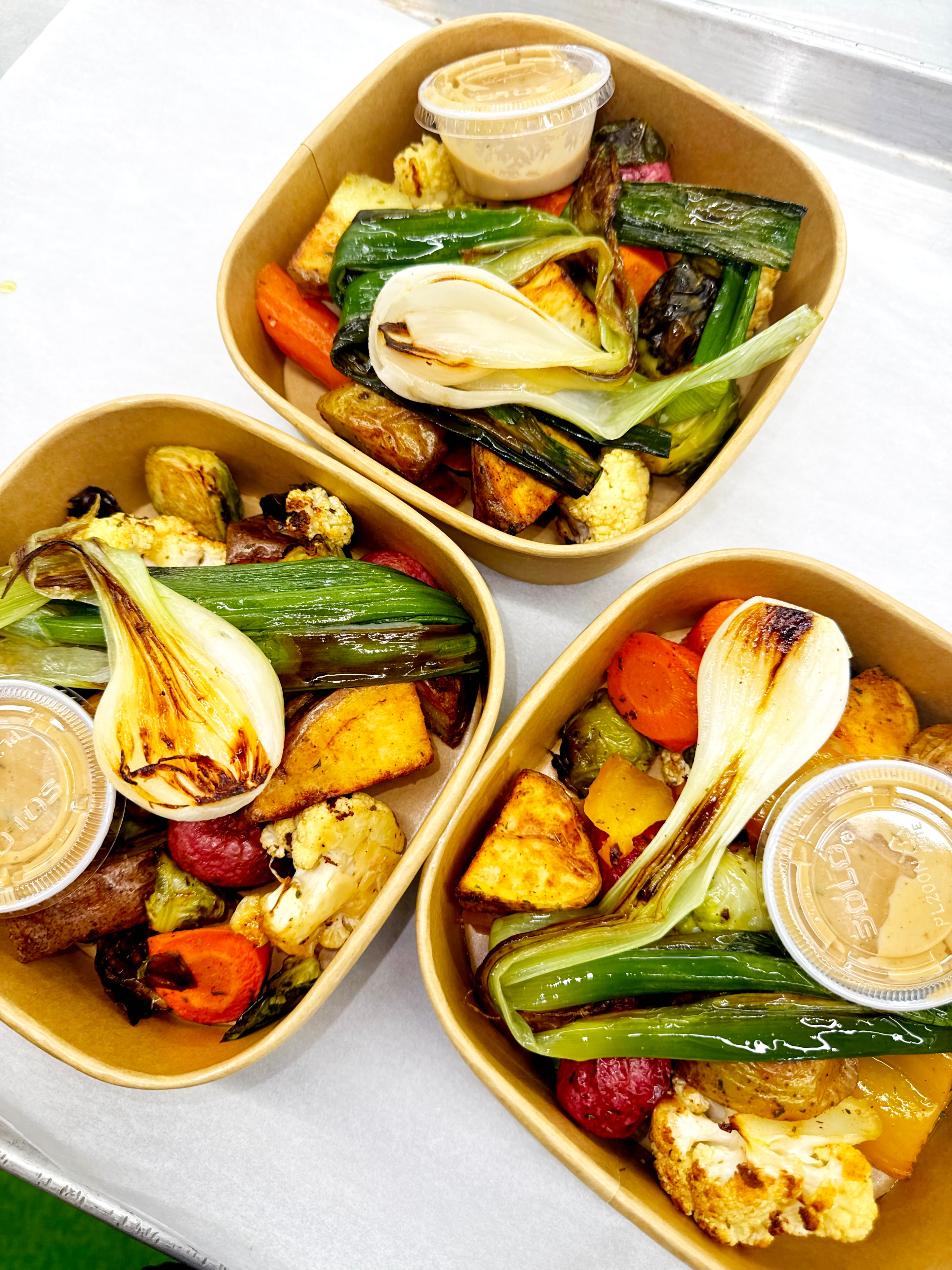 Boxes of roasted mixed vegetables